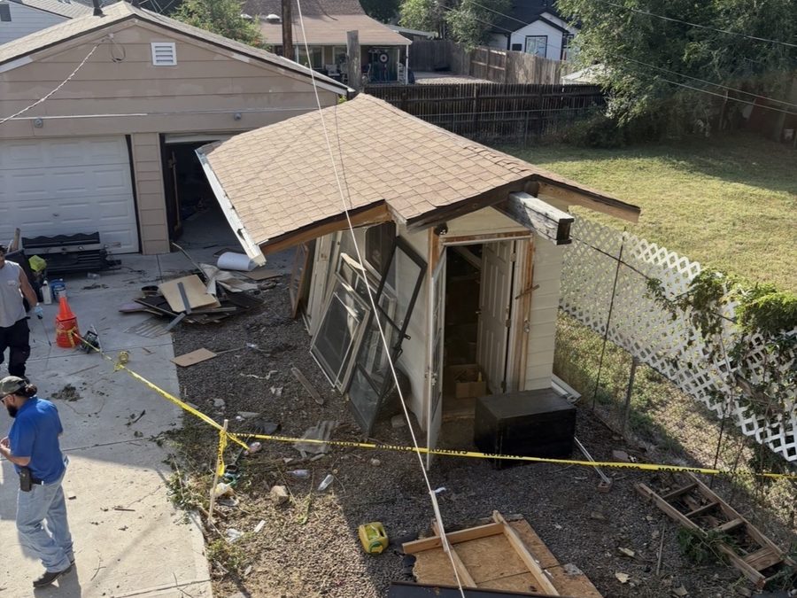 Backyard shed being taken apart during a demolition job